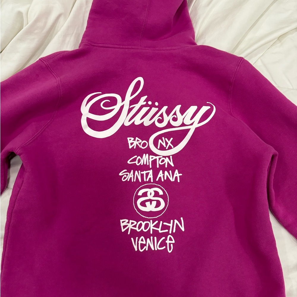 Stussy World Tour hoodie in Color Pink